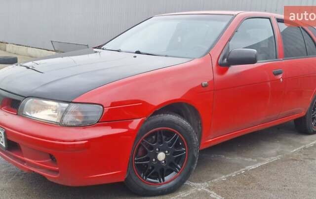Красный Ниссан Альмера, объемом двигателя 1.39 л и пробегом 29 тыс. км за 2250 $, фото 1 на Automoto.ua