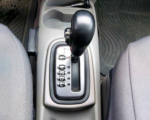 Красный Ниссан Альмера, объемом двигателя 2 л и пробегом 170 тыс. км за 3500 $, фото 6 на Automoto.ua