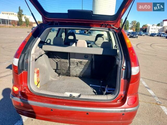 Красный Ниссан Альмера, объемом двигателя 2 л и пробегом 170 тыс. км за 3500 $, фото 13 на Automoto.ua