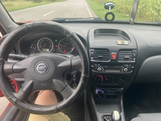 Червоний Ніссан Альмера, об'ємом двигуна 0 л та пробігом 298 тис. км за 1651 $, фото 6 на Automoto.ua