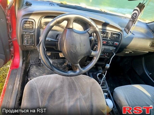 Червоний Ніссан Альмера, об'ємом двигуна 2 л та пробігом 0 тис. км за 350 $, фото 6 на Automoto.ua