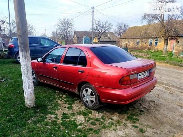 Червоний Ніссан Альмера, об'ємом двигуна 1.4 л та пробігом 223 тис. км за 2600 $, фото 3 на Automoto.ua