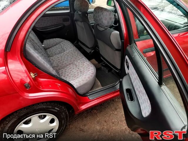 Красный Ниссан Альмера, объемом двигателя 1.4 л и пробегом 174 тыс. км за 2300 $, фото 9 на Automoto.ua