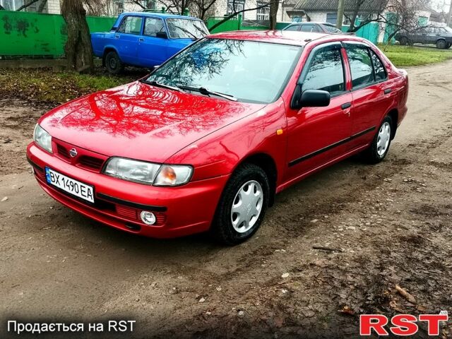 Красный Ниссан Альмера, объемом двигателя 1.4 л и пробегом 174 тыс. км за 2300 $, фото 4 на Automoto.ua