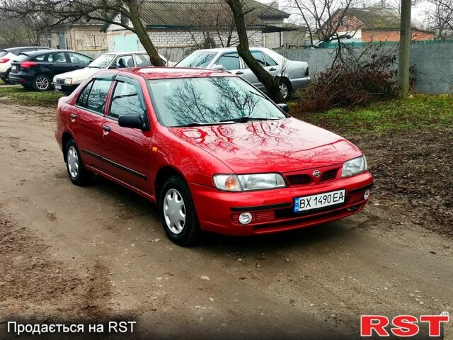 Красный Ниссан Альмера, объемом двигателя 1.4 л и пробегом 174 тыс. км за 2300 $, фото 5 на Automoto.ua