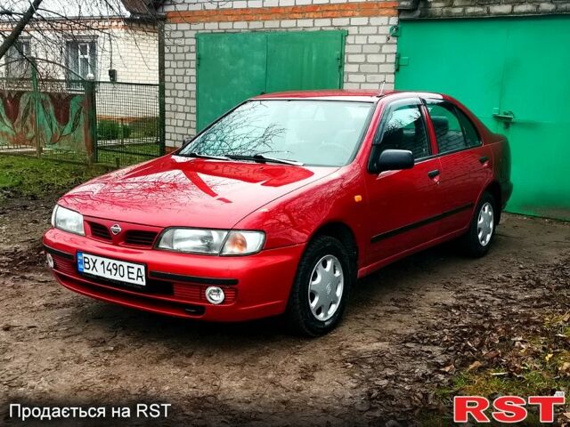 Красный Ниссан Альмера, объемом двигателя 1.4 л и пробегом 174 тыс. км за 2300 $, фото 1 на Automoto.ua