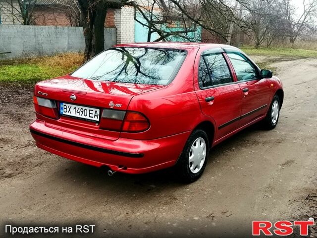 Красный Ниссан Альмера, объемом двигателя 1.4 л и пробегом 174 тыс. км за 2300 $, фото 2 на Automoto.ua