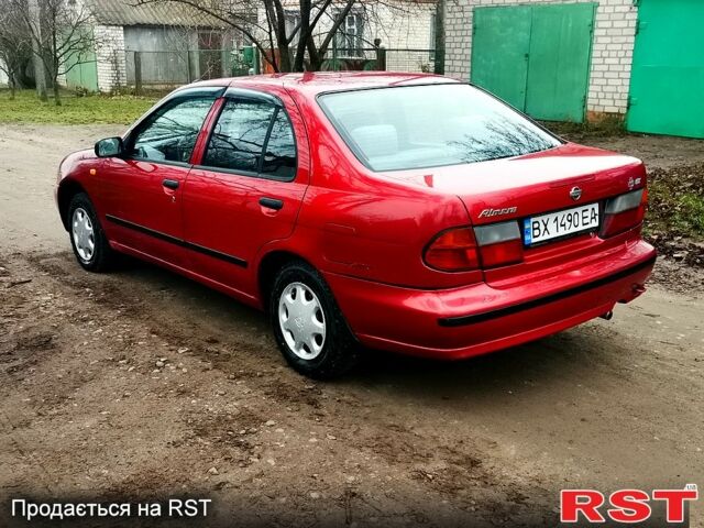 Красный Ниссан Альмера, объемом двигателя 1.4 л и пробегом 174 тыс. км за 2300 $, фото 3 на Automoto.ua