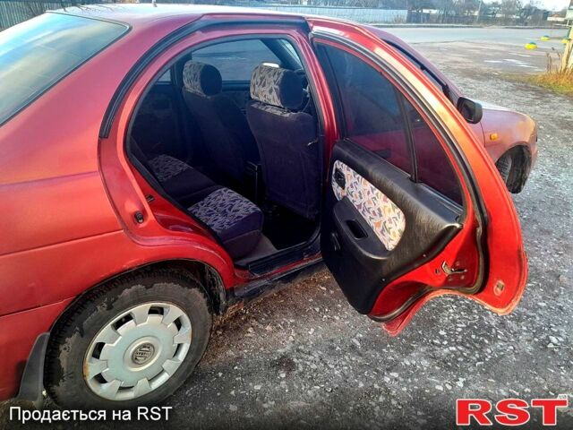 Красный Ниссан Альмера, объемом двигателя 14 л и пробегом 430 тыс. км за 1000 $, фото 4 на Automoto.ua