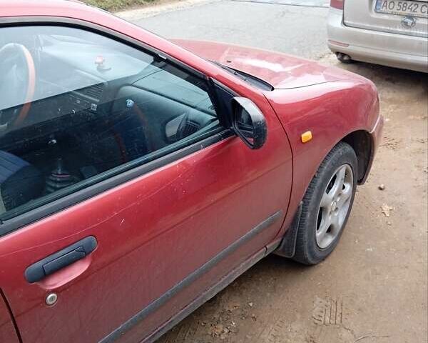 Красный Ниссан Альмера, объемом двигателя 1.4 л и пробегом 300 тыс. км за 1100 $, фото 2 на Automoto.ua