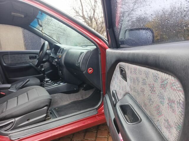 Червоний Ніссан Альмера, об'ємом двигуна 1.4 л та пробігом 3 тис. км за 1900 $, фото 3 на Automoto.ua