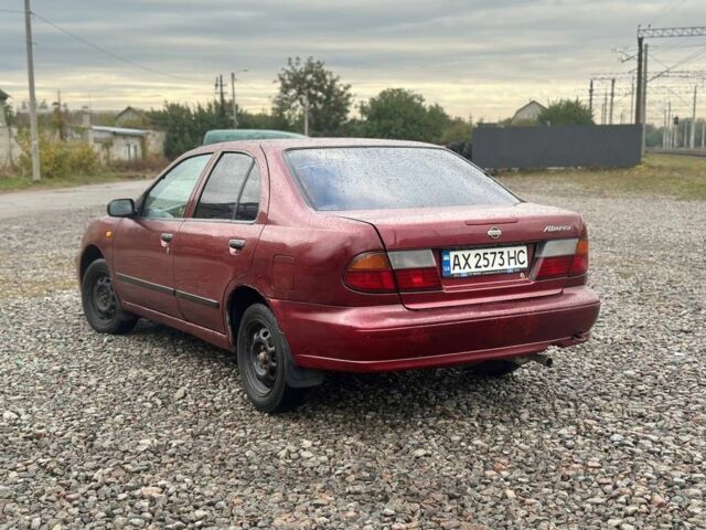 Красный Ниссан Альмера, объемом двигателя 1.4 л и пробегом 310 тыс. км за 1499 $, фото 1 на Automoto.ua