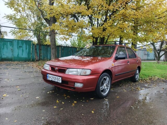 Червоний Ніссан Альмера, об'ємом двигуна 1.4 л та пробігом 3 тис. км за 1900 $, фото 6 на Automoto.ua