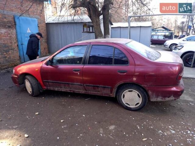 Красный Ниссан Альмера, объемом двигателя 1.4 л и пробегом 300 тыс. км за 800 $, фото 1 на Automoto.ua
