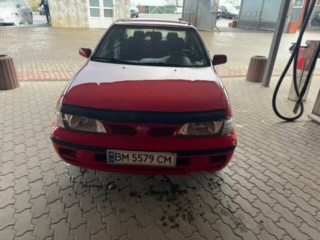 Червоний Ніссан Альмера, об'ємом двигуна 1.4 л та пробігом 250 тис. км за 1500 $, фото 4 на Automoto.ua