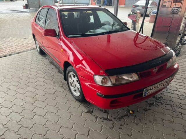 Червоний Ніссан Альмера, об'ємом двигуна 1.4 л та пробігом 250 тис. км за 1500 $, фото 5 на Automoto.ua