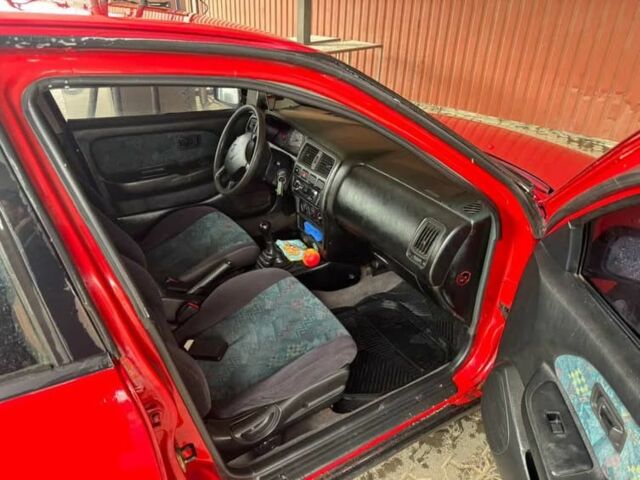 Червоний Ніссан Альмера, об'ємом двигуна 1.4 л та пробігом 250 тис. км за 1500 $, фото 6 на Automoto.ua