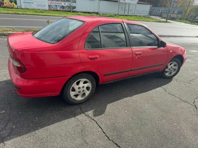 Червоний Ніссан Альмера, об'ємом двигуна 1.4 л та пробігом 250 тис. км за 1500 $, фото 2 на Automoto.ua