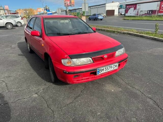 Червоний Ніссан Альмера, об'ємом двигуна 1.4 л та пробігом 250 тис. км за 1500 $, фото 3 на Automoto.ua