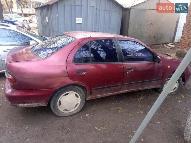 Красный Ниссан Альмера, объемом двигателя 1.4 л и пробегом 300 тыс. км за 800 $, фото 3 на Automoto.ua