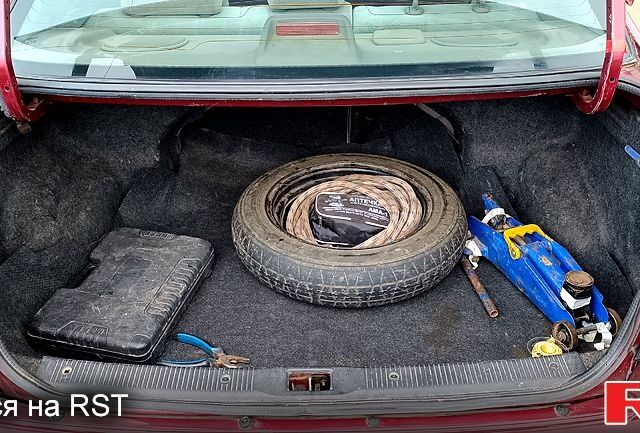 Червоний Ніссан Альмера, об'ємом двигуна 1.5 л та пробігом 320 тис. км за 3999 $, фото 6 на Automoto.ua