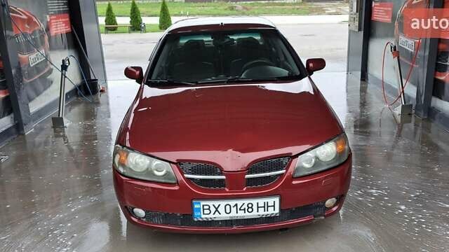 Красный Ниссан Альмера, объемом двигателя 1.5 л и пробегом 231 тыс. км за 3100 $, фото 1 на Automoto.ua