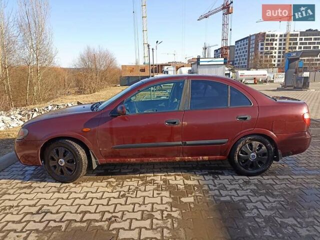 Красный Ниссан Альмера, объемом двигателя 1.5 л и пробегом 253 тыс. км за 2500 $, фото 2 на Automoto.ua