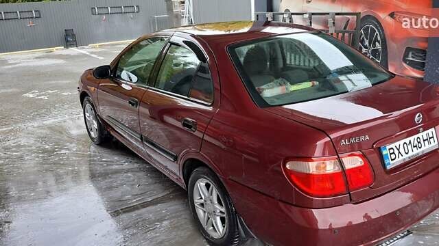 Красный Ниссан Альмера, объемом двигателя 1.5 л и пробегом 231 тыс. км за 3100 $, фото 7 на Automoto.ua