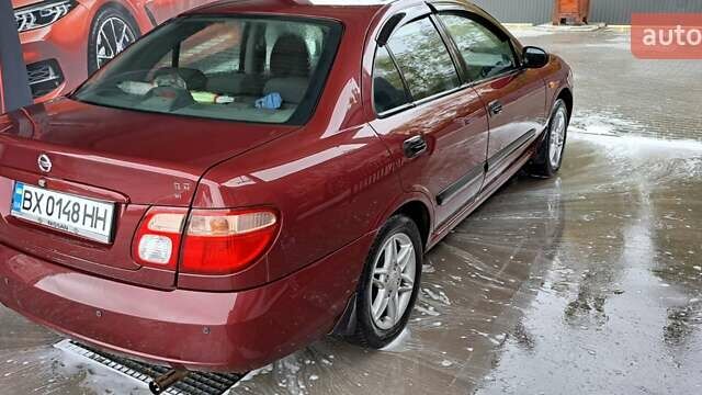 Красный Ниссан Альмера, объемом двигателя 1.5 л и пробегом 231 тыс. км за 3100 $, фото 4 на Automoto.ua