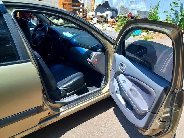 Ниссан Альмера, объемом двигателя 1.5 л и пробегом 835 тыс. км за 1300 $, фото 2 на Automoto.ua