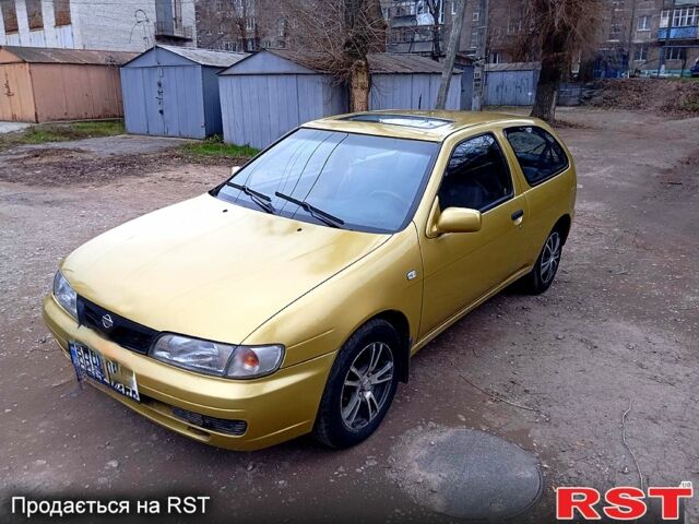 Жовтий Ніссан Альмера, об'ємом двигуна 1.4 л та пробігом 280 тис. км за 2700 $, фото 1 на Automoto.ua