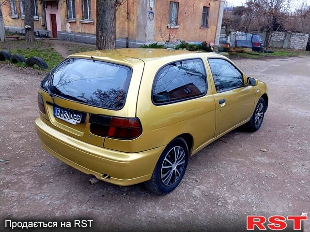 Жовтий Ніссан Альмера, об'ємом двигуна 1.4 л та пробігом 280 тис. км за 2700 $, фото 3 на Automoto.ua