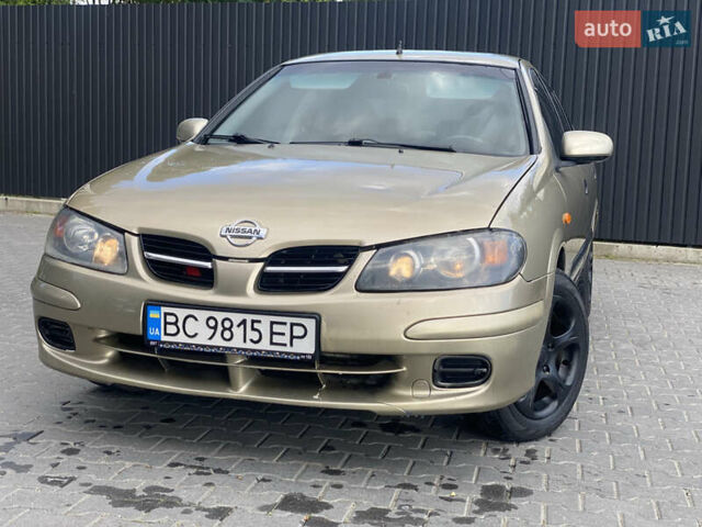 Желтый Ниссан Альмера, объемом двигателя 1.5 л и пробегом 250 тыс. км за 3000 $, фото 2 на Automoto.ua