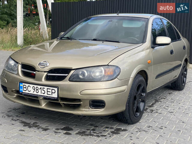 Желтый Ниссан Альмера, объемом двигателя 1.5 л и пробегом 250 тыс. км за 3000 $, фото 7 на Automoto.ua