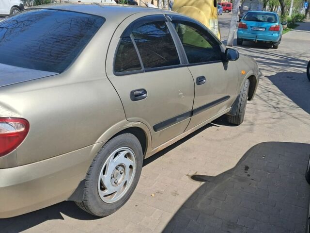 Желтый Ниссан Альмера, объемом двигателя 1.8 л и пробегом 298 тыс. км за 2700 $, фото 6 на Automoto.ua