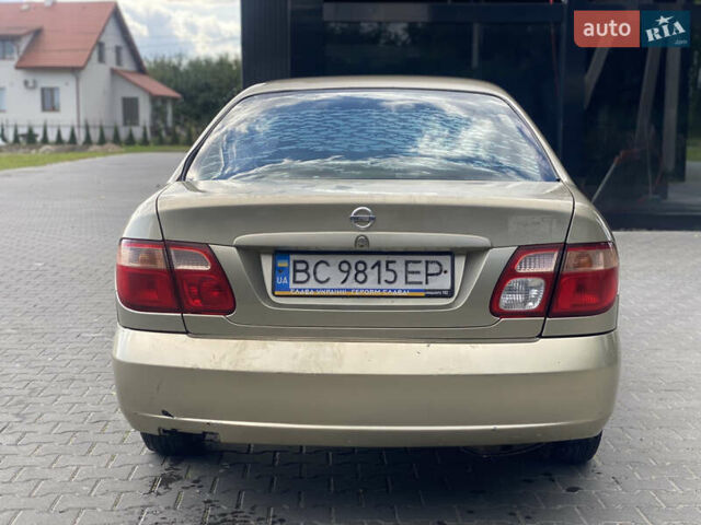 Желтый Ниссан Альмера, объемом двигателя 1.5 л и пробегом 250 тыс. км за 3000 $, фото 4 на Automoto.ua
