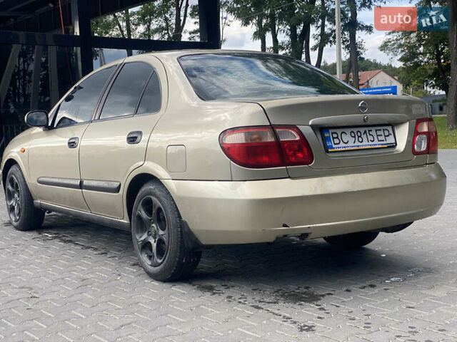 Желтый Ниссан Альмера, объемом двигателя 1.5 л и пробегом 250 тыс. км за 3000 $, фото 5 на Automoto.ua