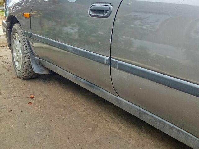 Сірий Ніссан Альмера, об'ємом двигуна 1.6 л та пробігом 100 тис. км за 1200 $, фото 3 на Automoto.ua