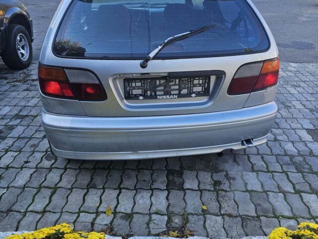 Серый Ниссан Альмера, объемом двигателя 1.6 л и пробегом 320 тыс. км за 650 $, фото 1 на Automoto.ua