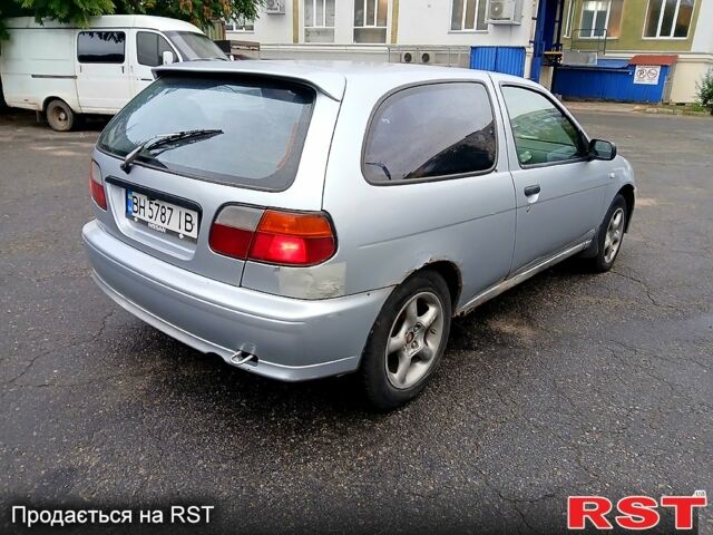 Серый Ниссан Альмера, объемом двигателя 1.6 л и пробегом 250 тыс. км за 1200 $, фото 2 на Automoto.ua