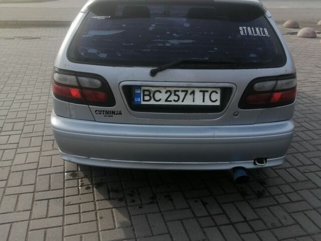 Серый Ниссан Альмера, объемом двигателя 1.6 л и пробегом 247 тыс. км за 950 $, фото 4 на Automoto.ua