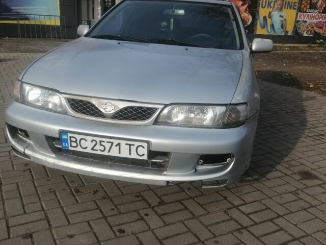 Серый Ниссан Альмера, объемом двигателя 1.6 л и пробегом 247 тыс. км за 950 $, фото 1 на Automoto.ua