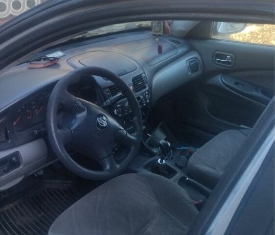 Сірий Ніссан Альмера, об'ємом двигуна 2.2 л та пробігом 320 тис. км за 1200 $, фото 3 на Automoto.ua