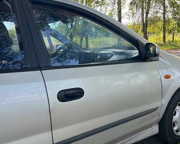 Серый Ниссан Альмера, объемом двигателя 2 л и пробегом 205 тыс. км за 3800 $, фото 9 на Automoto.ua