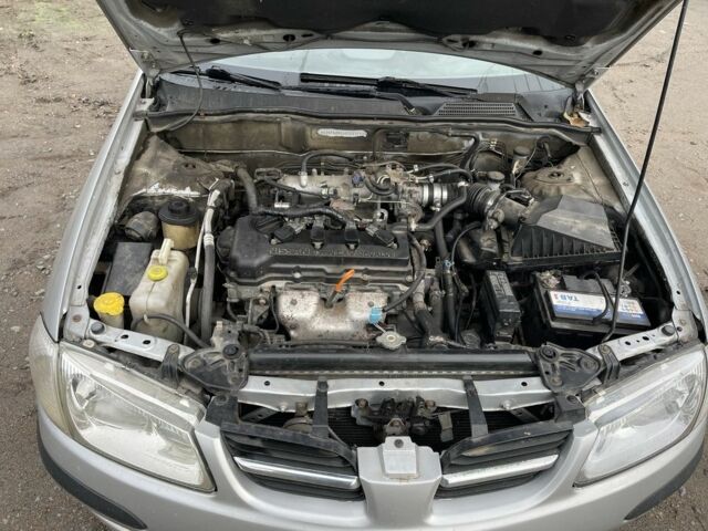 Серый Ниссан Альмера, объемом двигателя 1.8 л и пробегом 202 тыс. км за 2100 $, фото 10 на Automoto.ua