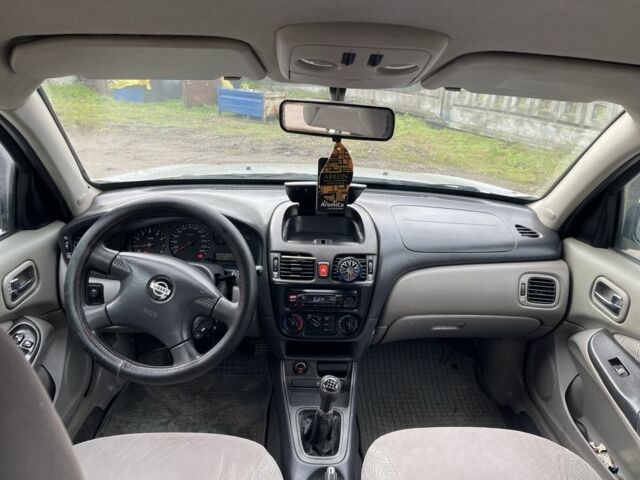 Серый Ниссан Альмера, объемом двигателя 1.8 л и пробегом 202 тыс. км за 2100 $, фото 6 на Automoto.ua