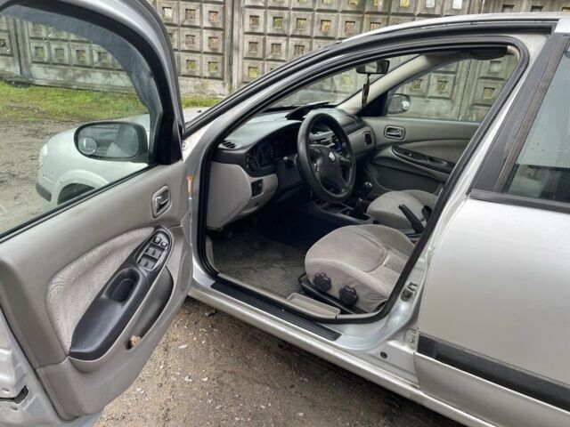 Серый Ниссан Альмера, объемом двигателя 1.8 л и пробегом 202 тыс. км за 2100 $, фото 8 на Automoto.ua