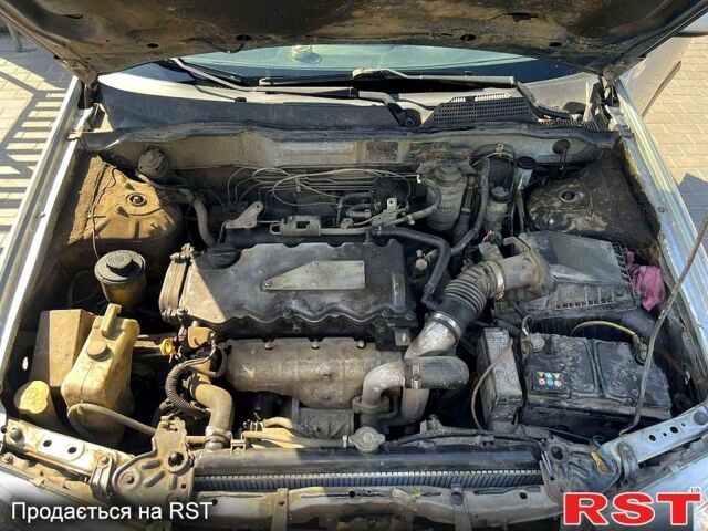 Серый Ниссан Альмера, объемом двигателя 2.2 л и пробегом 371 тыс. км за 1080 $, фото 3 на Automoto.ua