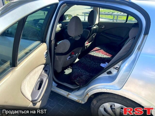 Серый Ниссан Альмера, объемом двигателя 2.2 л и пробегом 371 тыс. км за 1080 $, фото 5 на Automoto.ua