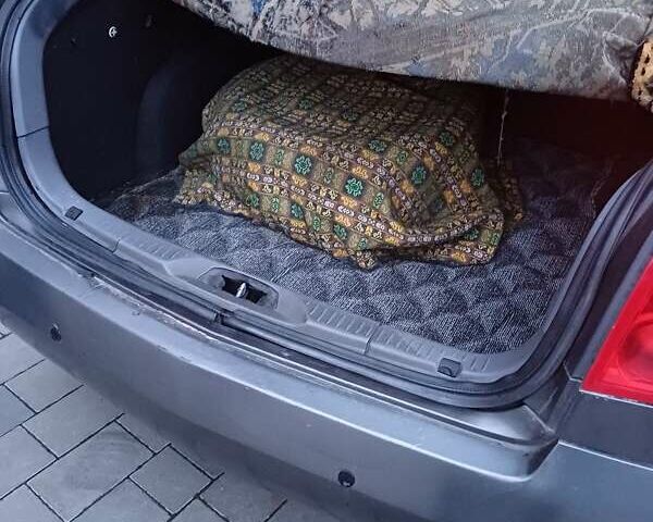 Сірий Ніссан Альмера, об'ємом двигуна 2 л та пробігом 280 тис. км за 3333 $, фото 12 на Automoto.ua